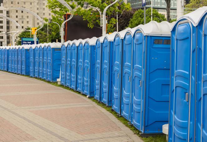 a line of portable restrooms set up for a wedding or special event, ensuring guests have access to comfortable and clean facilities throughout the duration of the celebration in New Carlisle IN